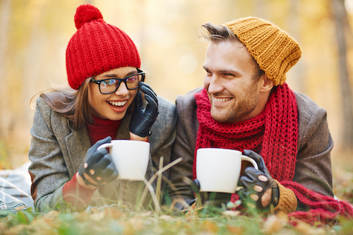 Attractive dates with tea or coffee relaxing in natural environment